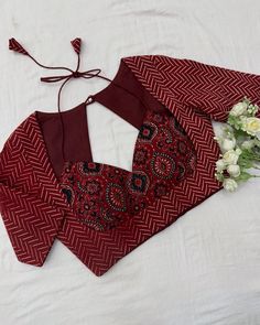 Rustic_Red_Badam_Ajrakh_Cotton_Saree_Blouse_Set.___Each_motif_tells_a_story,_each_hue_sings_a_song—of_artisans_dipping_their_dreams_into_natural_dyes,(Unknown)